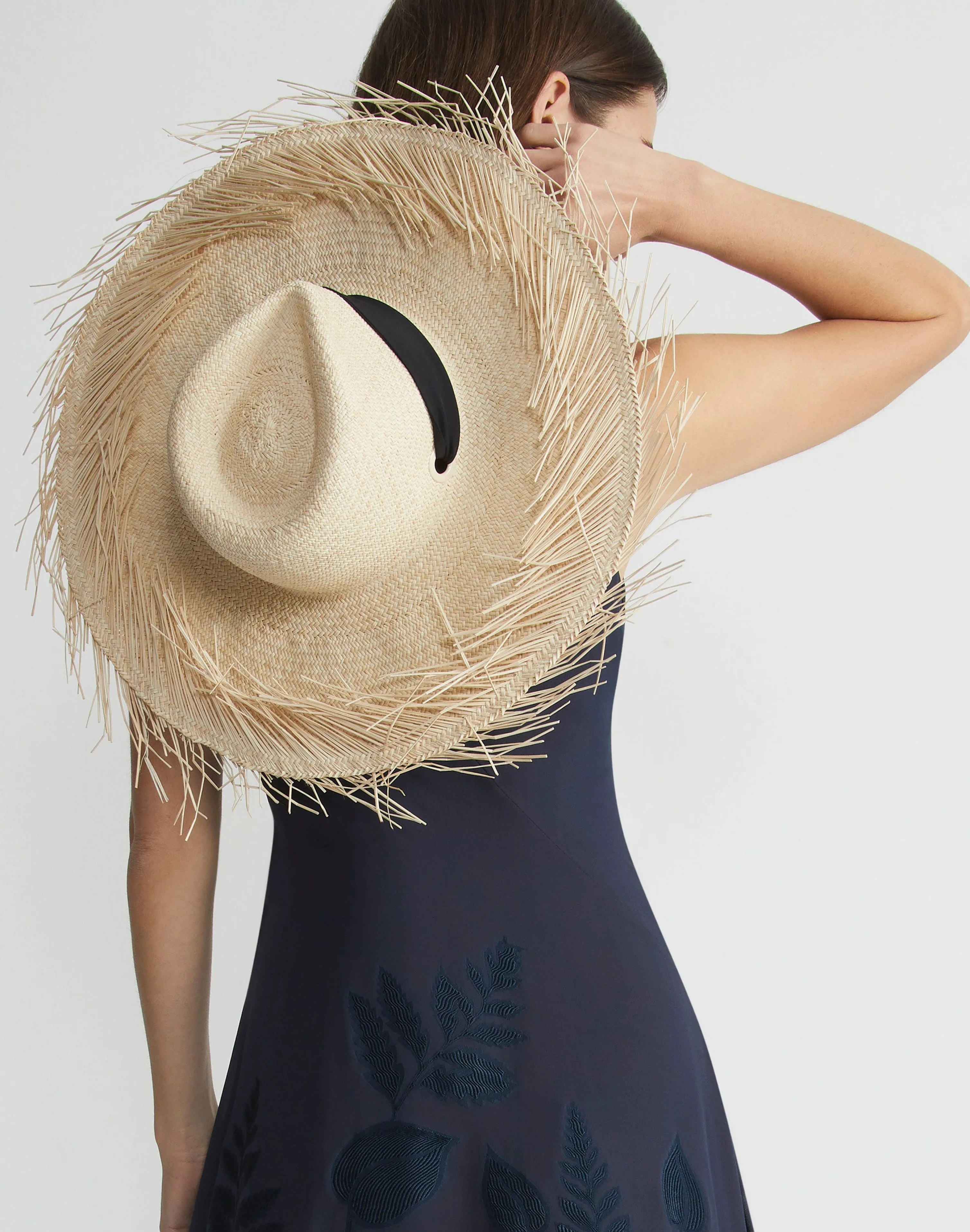 Handwoven Straw Fringed Hat